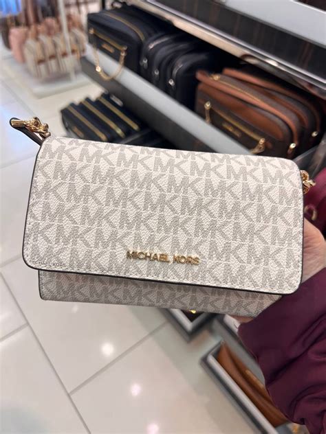 michael kors medium multifunction phone crossbody bag clutch bright white|Michael Kors saffiano crossbody bag.